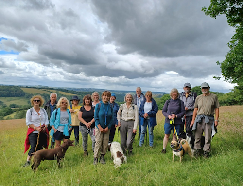 Walking group stop on the track down from Haddon Hill to Bury