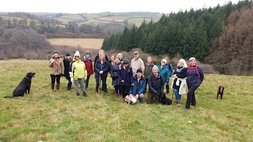The group stop to admire the view from just above the boundary between Stoodleigh and Oakford