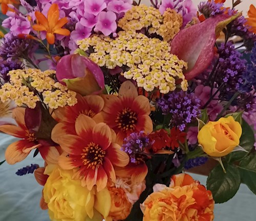 Vase of colourful flowers