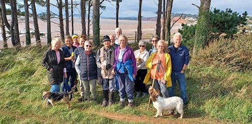 Group of walkers with Budleigh Salterton and coast behind us