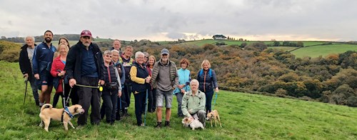 Taking a break and enjoying an autumnal view of woodland colours below