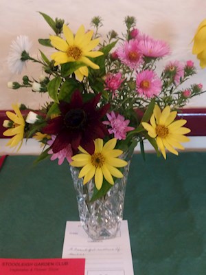 The winning vase of daisies